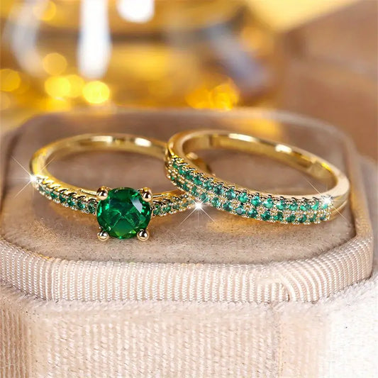 Conjunto de Anillos Dorados Dúo Esmeralda