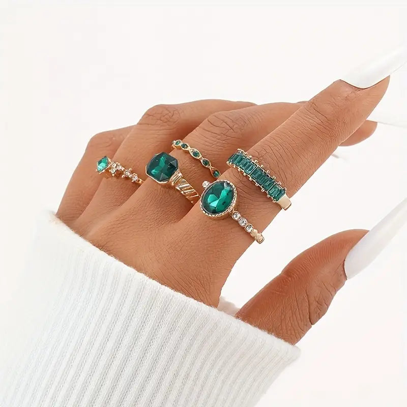 Conjunto de Anillos Dorados con Esmeralda Exquisita