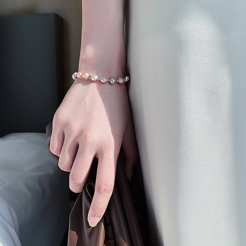 Pulsera de Perlas Rosadas en Oro