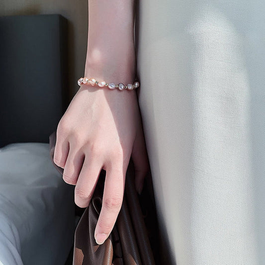 Pulsera de Perlas Rosadas en Oro