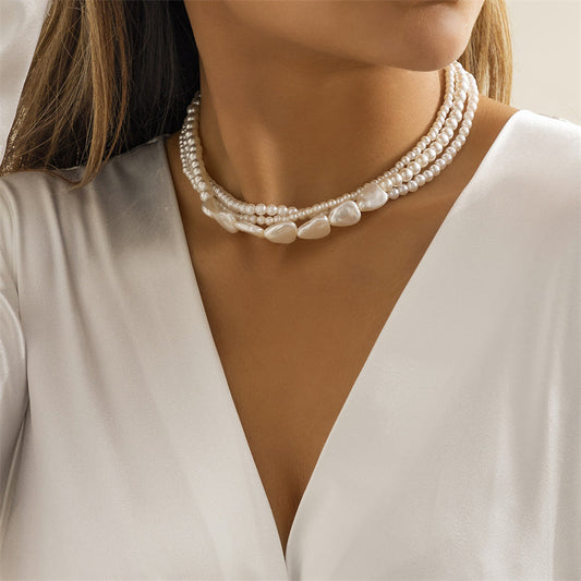 Colgante de Perla y Piedras Blancas en Oro