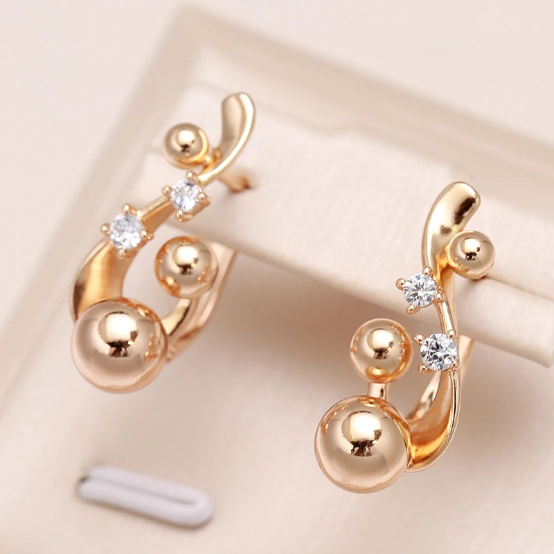 Pendientes Elegantes Redondeados en Oro con Circonia