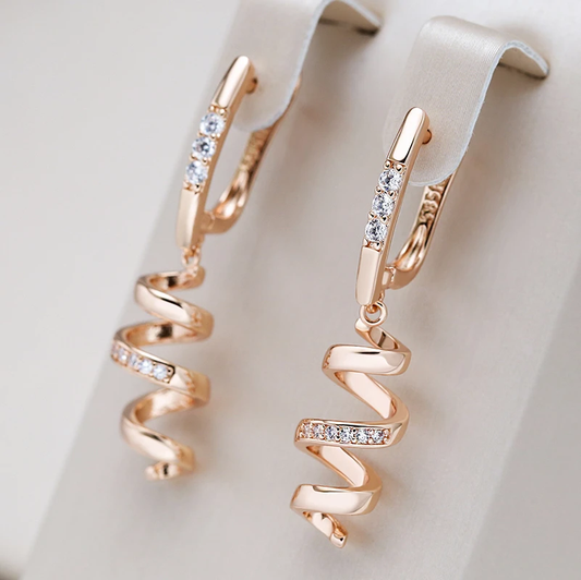 Pendientes Elegantes en Espiral con Circonia en Oro